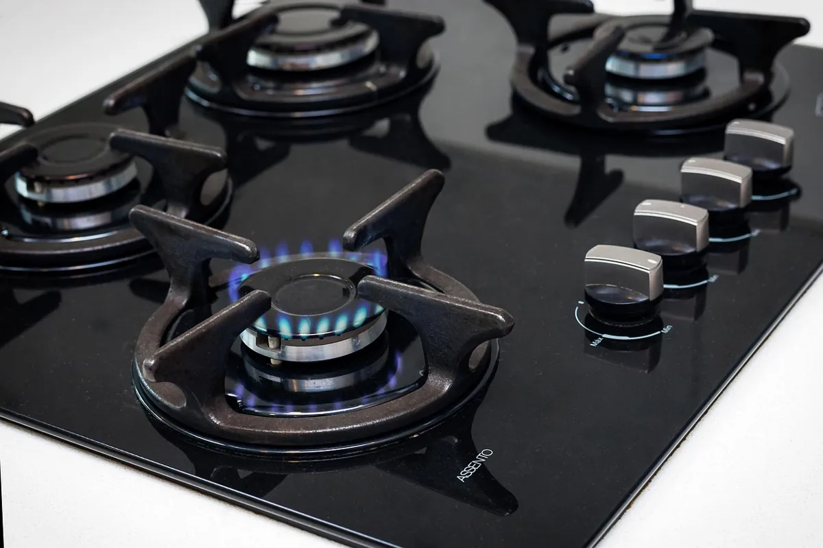 gas stove, gas, orange, kitchen, inside, dishwasher, stove, gas stove, gas stove, gas, gas, stove, stove, stove, stove, stove